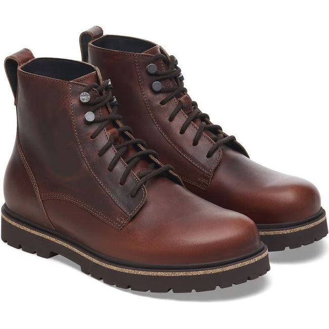 Pair of chocolate brown leather Birkenstock Highwood mid boots with lace up enclosure
