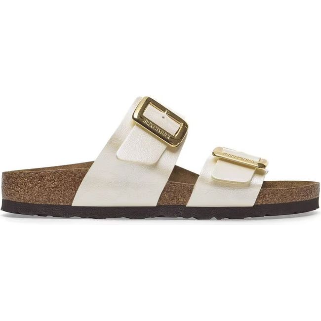 Lateral side of Birkenstock Women's Sydney Luxe Buckle Birko-Flor Narrow Sandal in pearl white