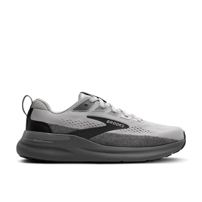 Lateral profile of Brooks Beast GTS 26 men's shoe in grey showing dark grey midsole and GuideRails broad base
