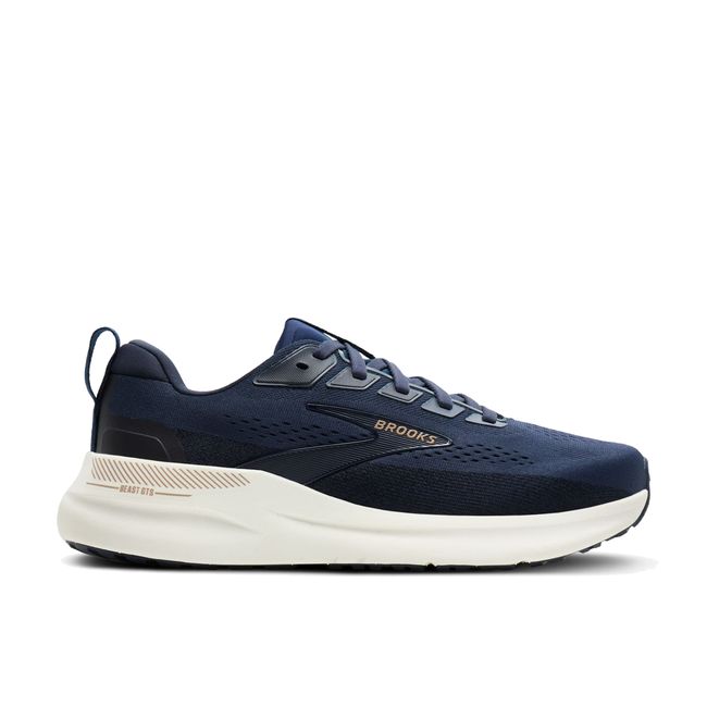 Lateral profile of Brooks Beast GTS 26 men's shoe in peacoat navy showing cream midsole and GuideRails broad base