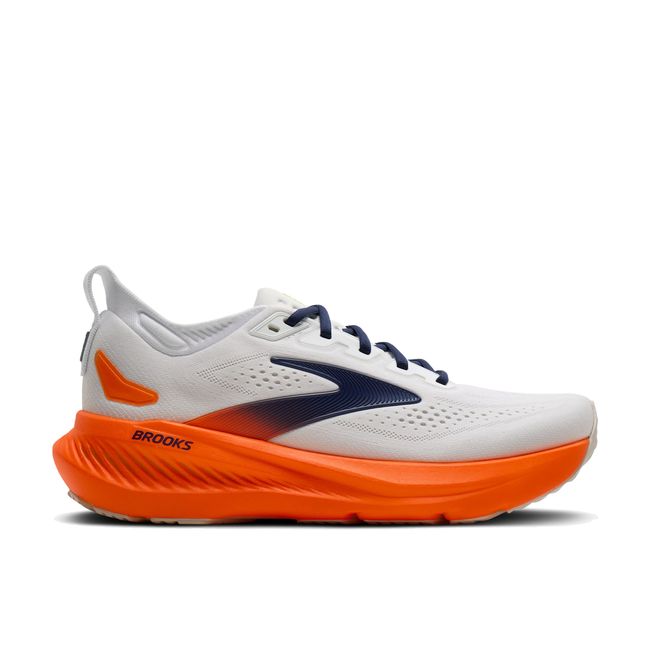 Lateral side profile of Brooks Glycerin 23 men's shoe in white showing oversized orange midsole stack and Brooks branding