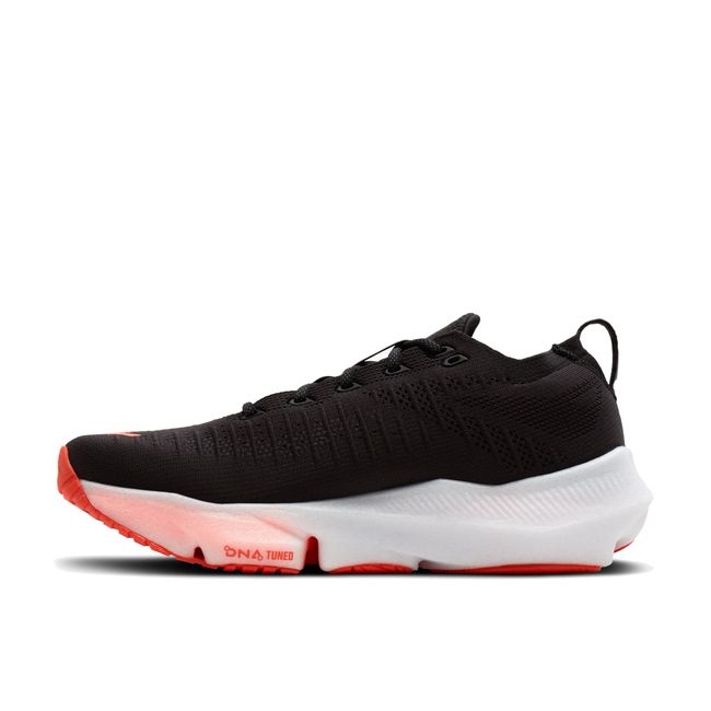 Medial side profile of Brooks Glycerin Flex in black and orange showing midfoot flex groove and midsole stack