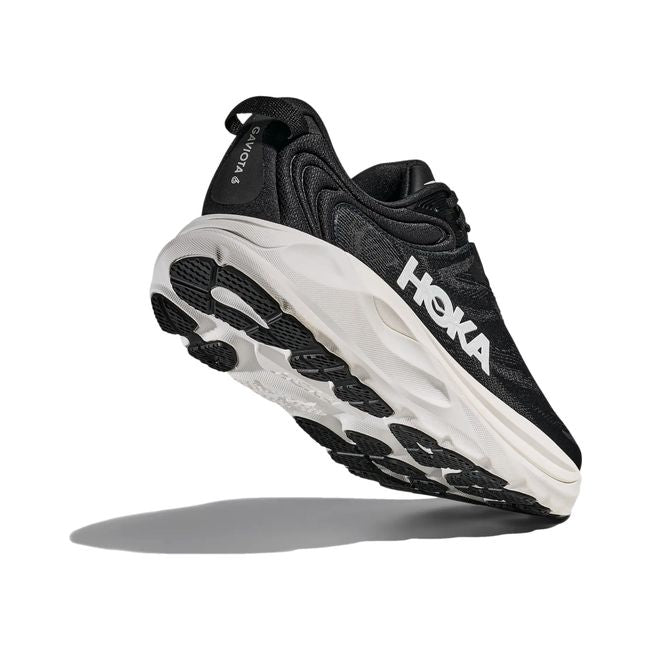 Hoka Mens Gaviota 6 running shoe in Black/White, angled outsole and heel tread detail