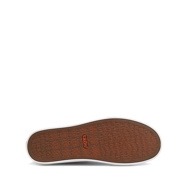 Outsole of the Taos Plim Soul Lux sneaker in black and white showing the tread