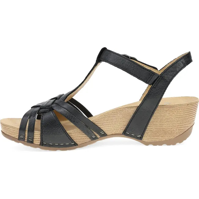 Medial side of Women's Dansko Tia Sandal in Black Milled Burnished with velcro strap