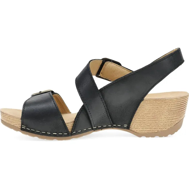 Medial side of Women's Dansko Trinity Sandal in Black Burnished Nubuck with a backstrap