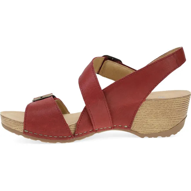 Medial side of Women's Dansko Trinity Sandal in Cayenne Burnished Nubuck with a backstrap