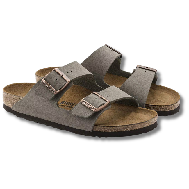 Angled pair of Birkenstock Unisex Arizona Birkibuc Sandal in Stone