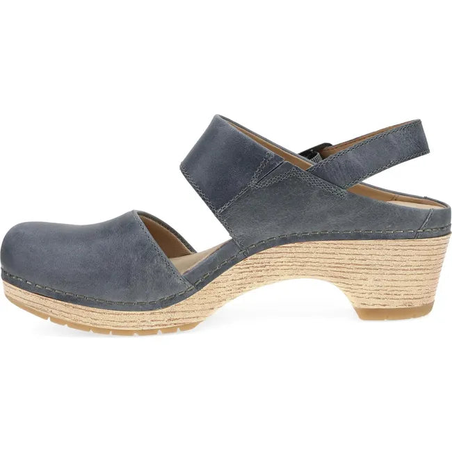 Medial side of Women's Dansko Lucia Closed Toe Sandal in navy leather with a 2 inch heel