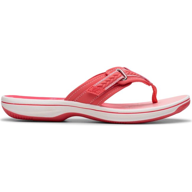 Lateral side of Women's Clarks Breezy Sun Flip Flop Sandal in Bright Coral Pink with velcro strap
