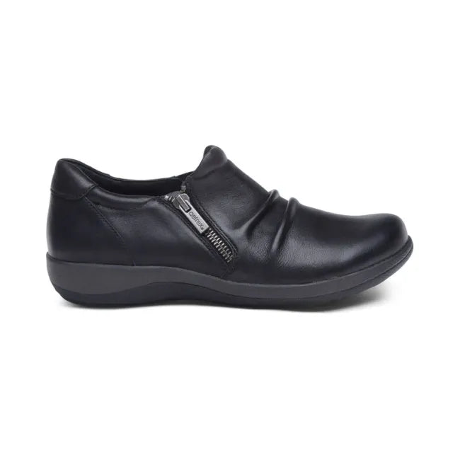 Side of of Aetrex Women's Katie Shoe in Black Leather with side zipper