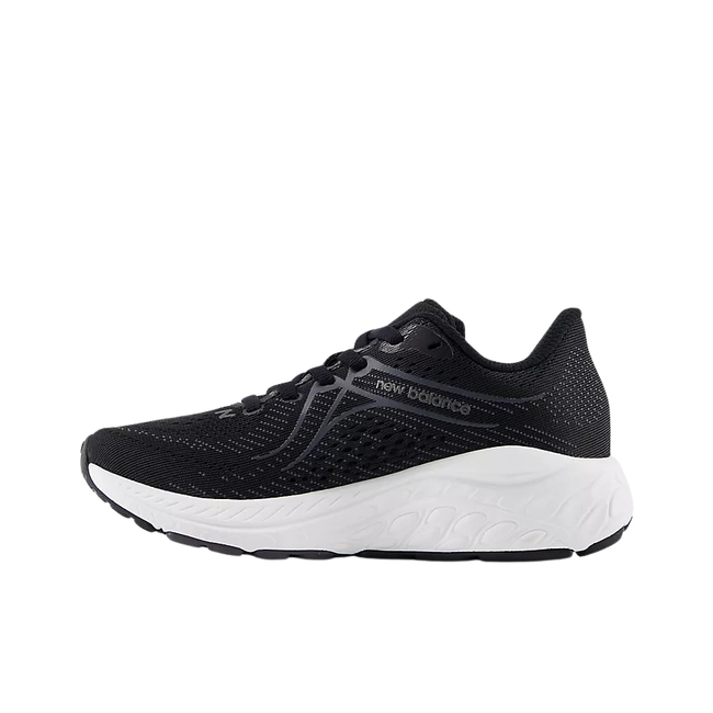 Medial side of New Balance Kids' 860 V13 Running Shoe in black