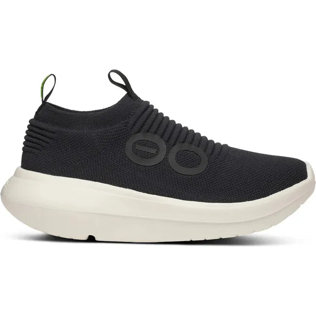 Lateral side of Men's OOfos OOmy Zen Sneaker in Black and Chalk white