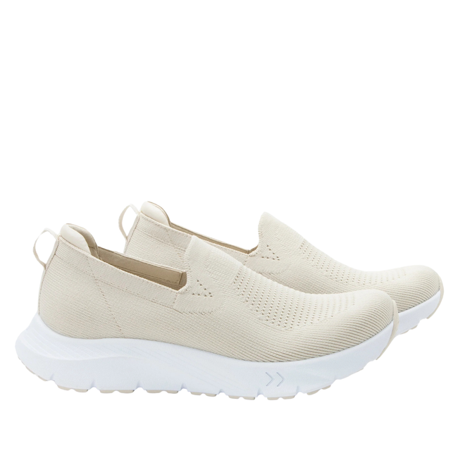 Lateral view of Women's Alegria Waze slip on shoes in sand color knit upper and white soles