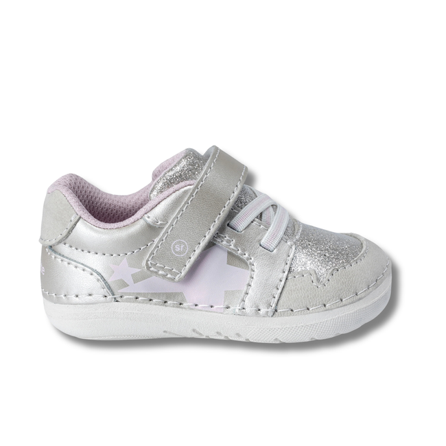 Lateral side of Stride Rite Kids' Soft Motion Waverly Toddler Sneaker in Champagne Metallic
