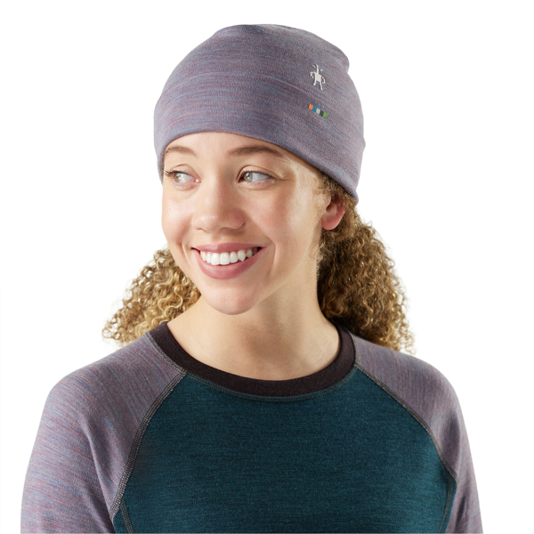 Women Wearing Smartwool Women's Thermal Merino Reversible Cuffed Beanie in Garden Pink