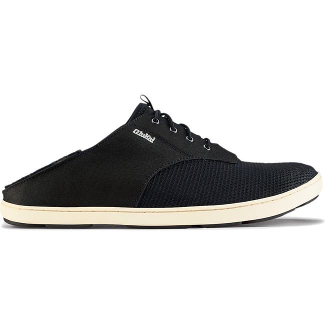 Lateral side of Men's Olukai Nohea Moku Sneaker in Onyx Onyx Black with heel dropped down