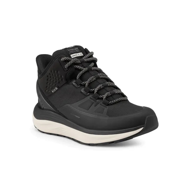 Angled view of Women’s Kizik London AT Mid Waterproof Boot in black with hands free step in