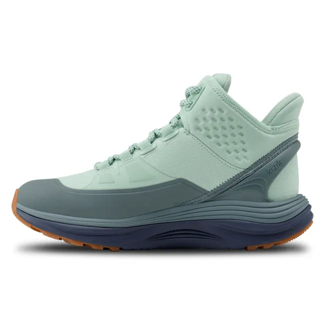 Medial side of Women’s Kizik London AT Mid Waterproof Boot in mint green with hands free step in