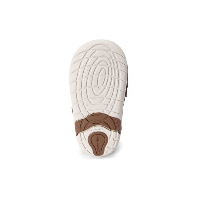 Outsole of the Stride Rite Alfredo Mini in cream and brown showing the non-marking tread