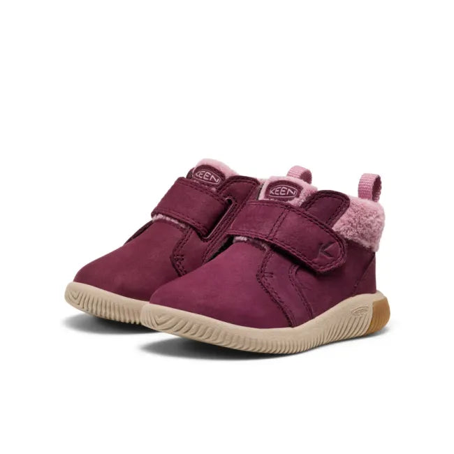 Pair  of KEEN Toddlers’ KNX Middie Boots in purple Fig Lilas with velcro straps