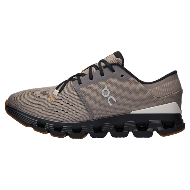 Medial side of men's On Cloud X 4 sneakers in grayish brown with black and copper accents