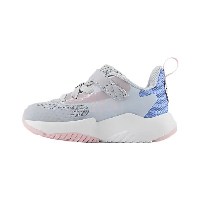 Medial of New Balance Infant Rave Run V2 Velcro Top Strap Running Shoe in gray, blue, and pink