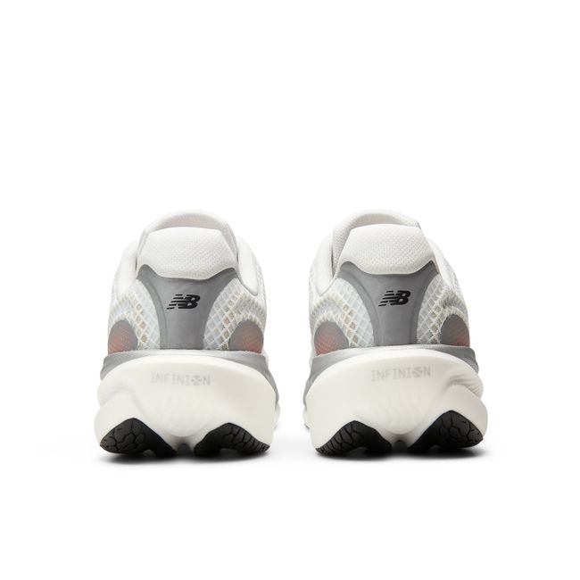 Rear heel view of the New Balance 1080v15 Breathe pair in white