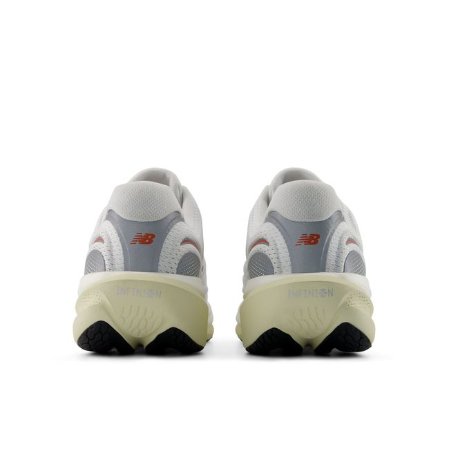 New Balance 1080 V15 running shoe in white and orange, heel view.