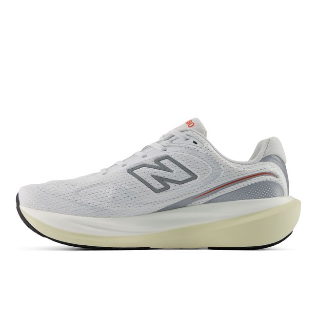 New Balance 1080 V15 running shoe in white and orange, medial profile.