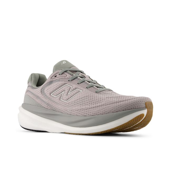 Pair of New Balance 1080v15 running shoes in warm taupe grey