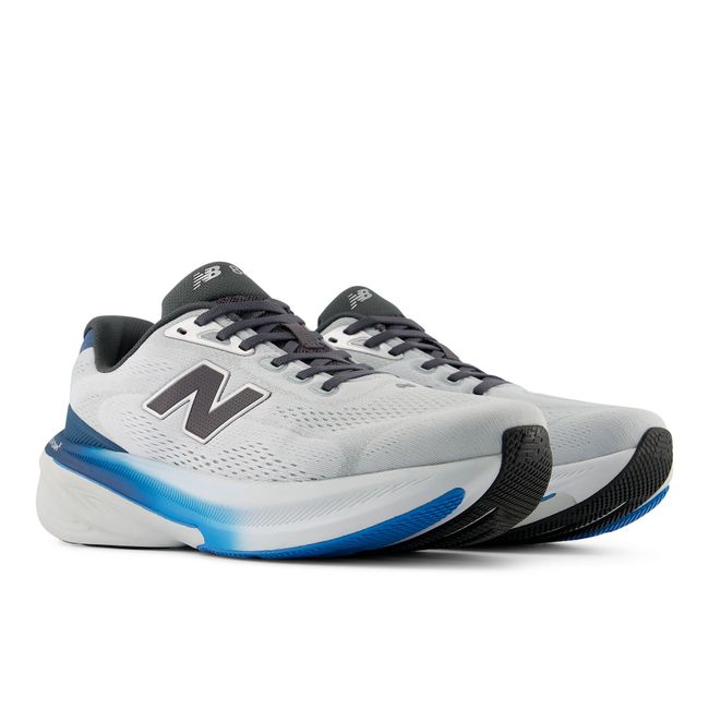 Pair of New Balance Fresh Foam X 860 running shoes in pale grey and blue