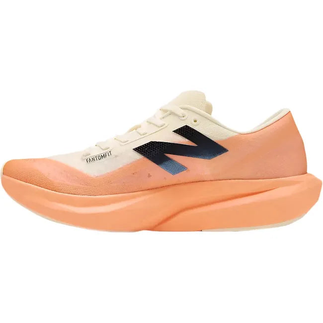 Medial side of New Balance Men's FuelCell Rebel V4 Running Shoe in hot mango orange