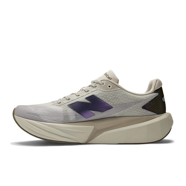 Medial side f New Balance Men's FuelCell Rebel V5 Running Shoe in Shipyard Beige
