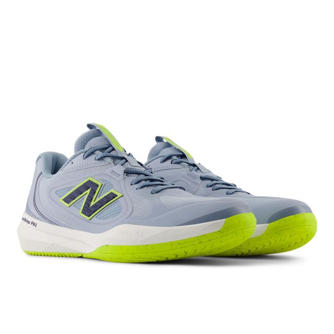 Pair of New Balance SmashStep PKL pickleball shoes in pale blue and navy