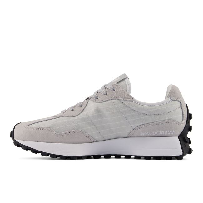 Medial profile of the New Balance 327 in pale grey suede and white mesh