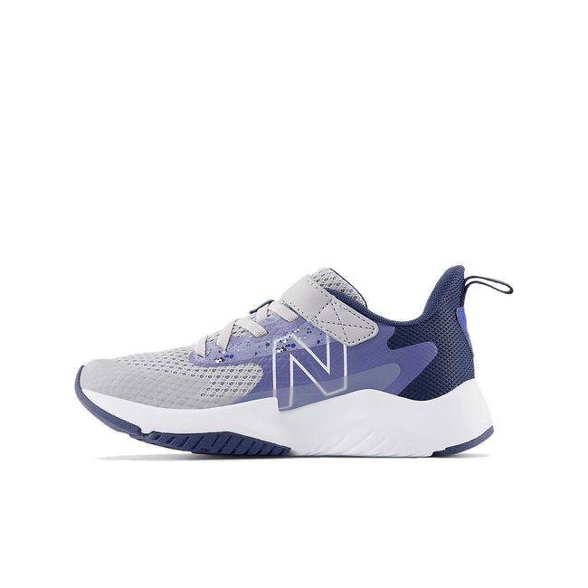 Medial side of New Balance Kids' Rave Run V2 Velcro Running Shoe in Grey & Navy